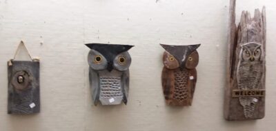 Pottery owls on driftwood by Elsie Sealander